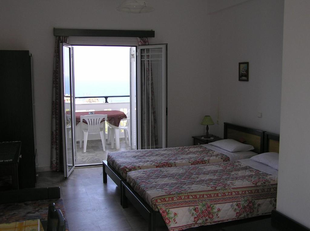 Knossos Aparthotel Pánormos Rum bild